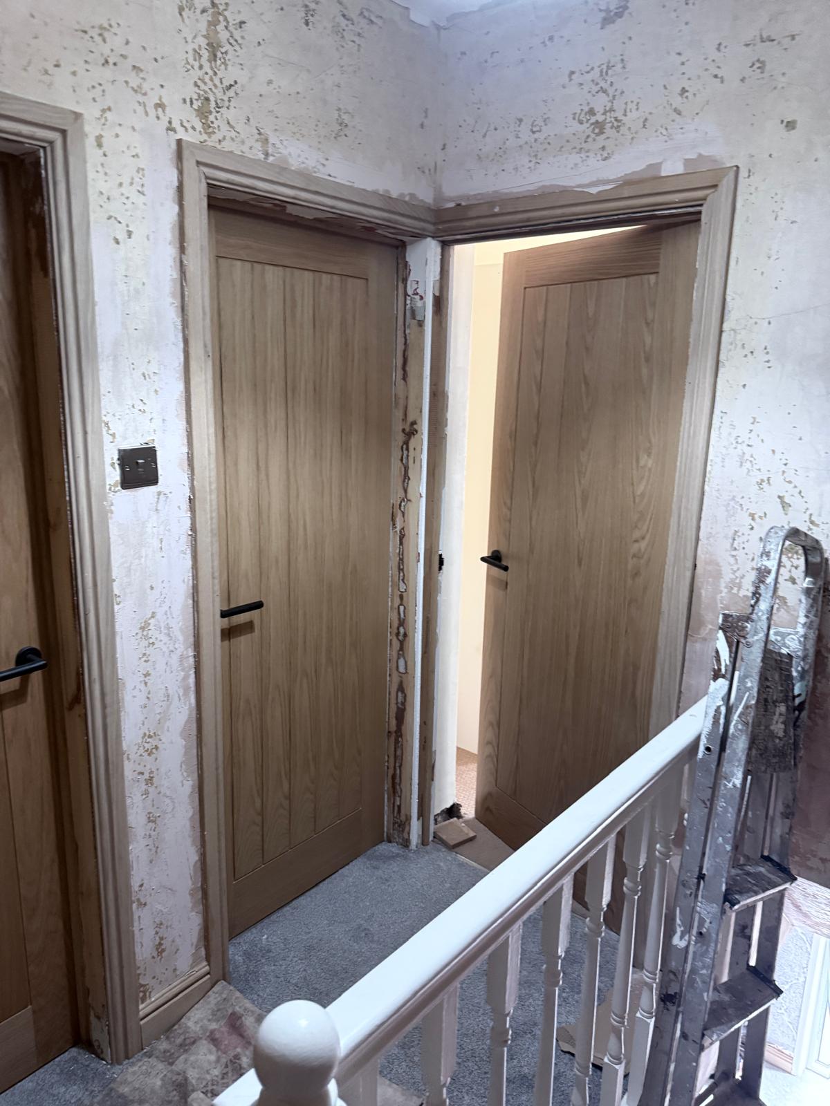 Oak internal doors fitted on landing in Manchester